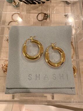 Sashi Gold Hoop Earring from Revolve